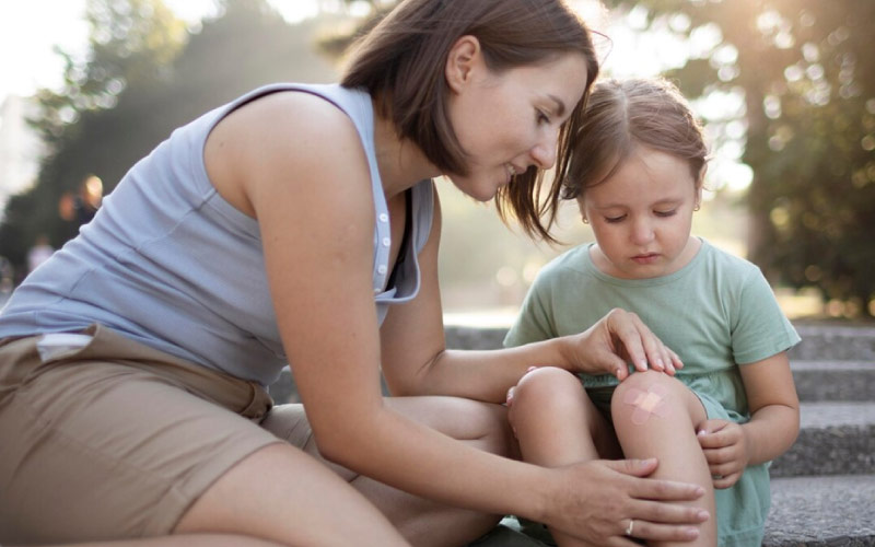 kid getting a scraped knee at the school playground, student safety, September 2024, Australia